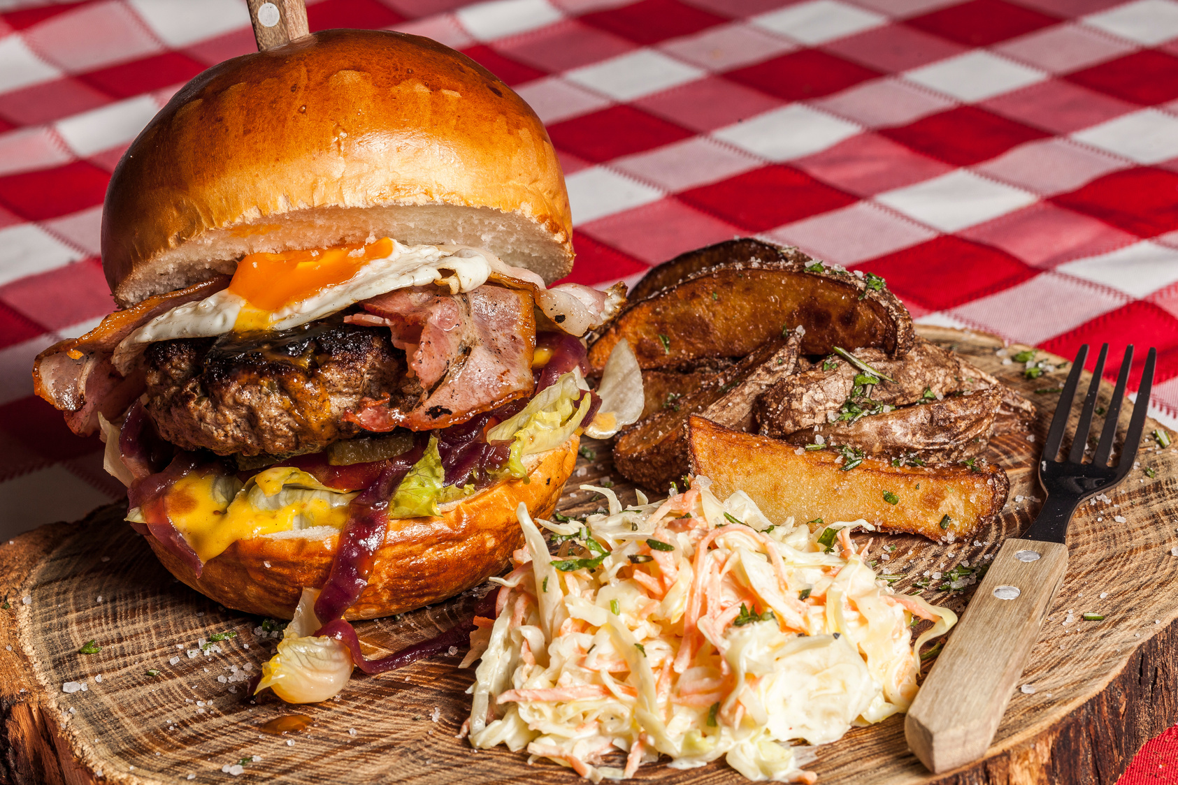 Meat Burger With Coleslaw on Side and Brown Handled Fork